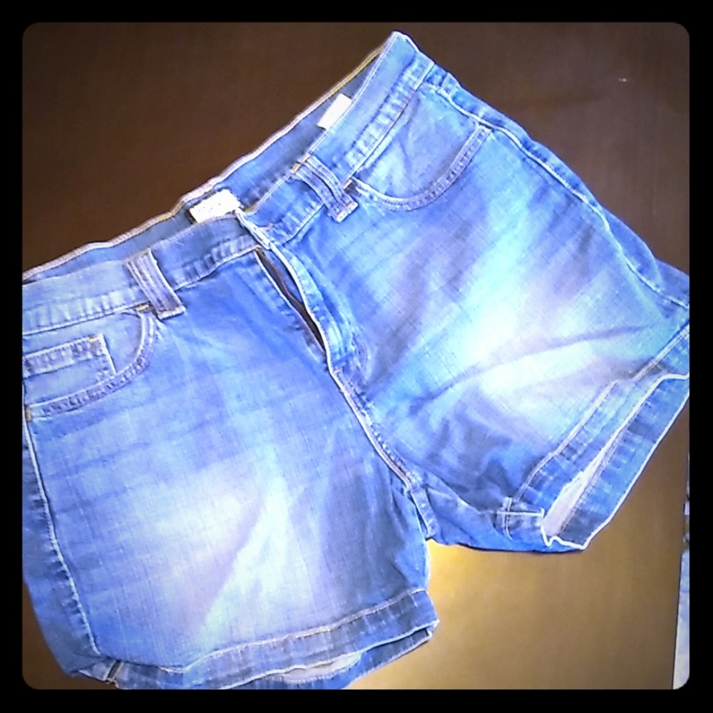 A pair of denim levi shorts